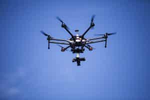 Large Black Drone Flying
