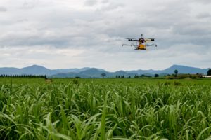 Agricultural Drone Flying Over Field