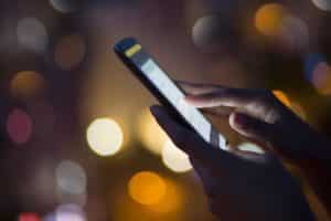 Smartphone Lit Up With App