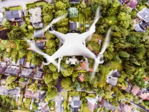 Drone Flying Above Village