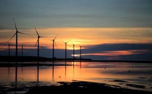 Wind Turbines in Sea Sunset