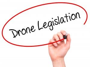 Man Writing Drone Legislation