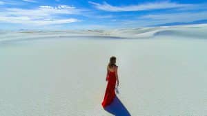 Woman Walking Through Sand