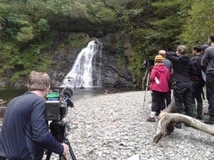 Film Crew Using Drone Waterfall