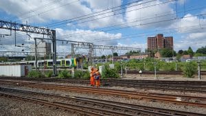 Railway Workers Stood on Traintrack