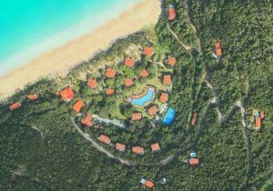 Aerial Photo of Houses by Sea