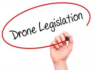 Man Writing Drone Legislation