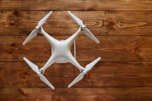 Drone Quadcopter On Wooden Background