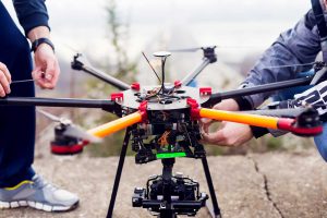 Close Up Men Maintaining Drone