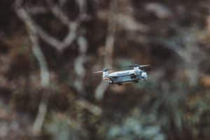 Small Drone Flying In Forest