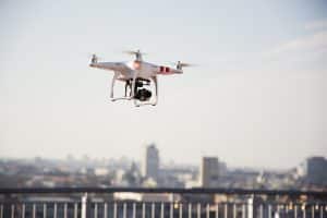 Drone Flying Over City Landscape