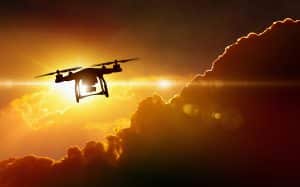 Drone Flying In Sunset Sky