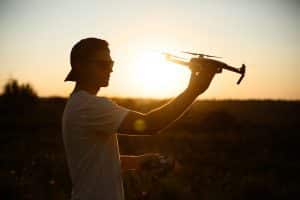 Drone Pilot Holding Small Drone