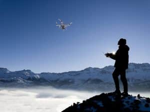 Drone Operator Flying Drone In Winter