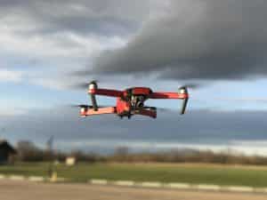 Small Drone Flying Over Runway