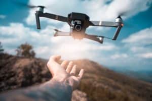 Male Hand Catching Drone