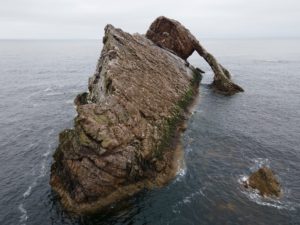 Natural sea arch the Bow Fiddle near Portknockie on the north-eastern coast of Scotland