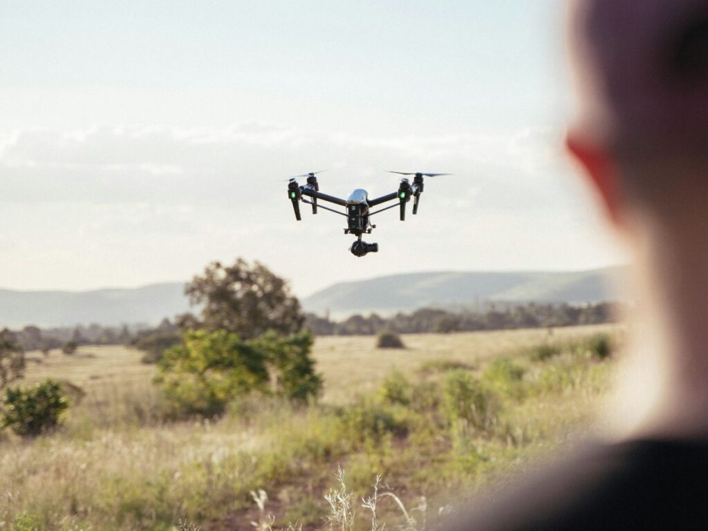 Operator flying a drone