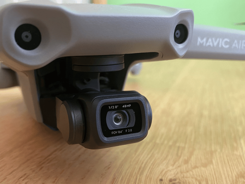 Mavic Air 2 drone on a desk representing the topic of Drone Equipment Insurance vs Extended Warranty