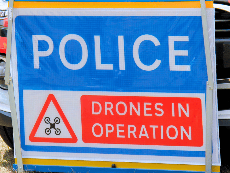 A sign stating Police Drones in Operation